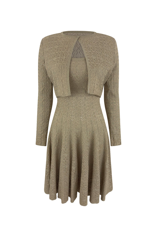Alaïa gold ribbed knit dress and matching cardigan set, front view on mannequin.