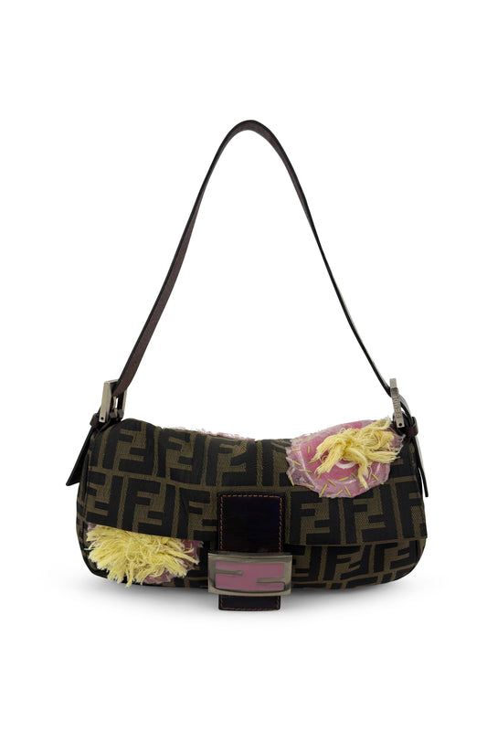 Fendi brown Zucca canvas Baguette bag with pink flower appliqué on white background