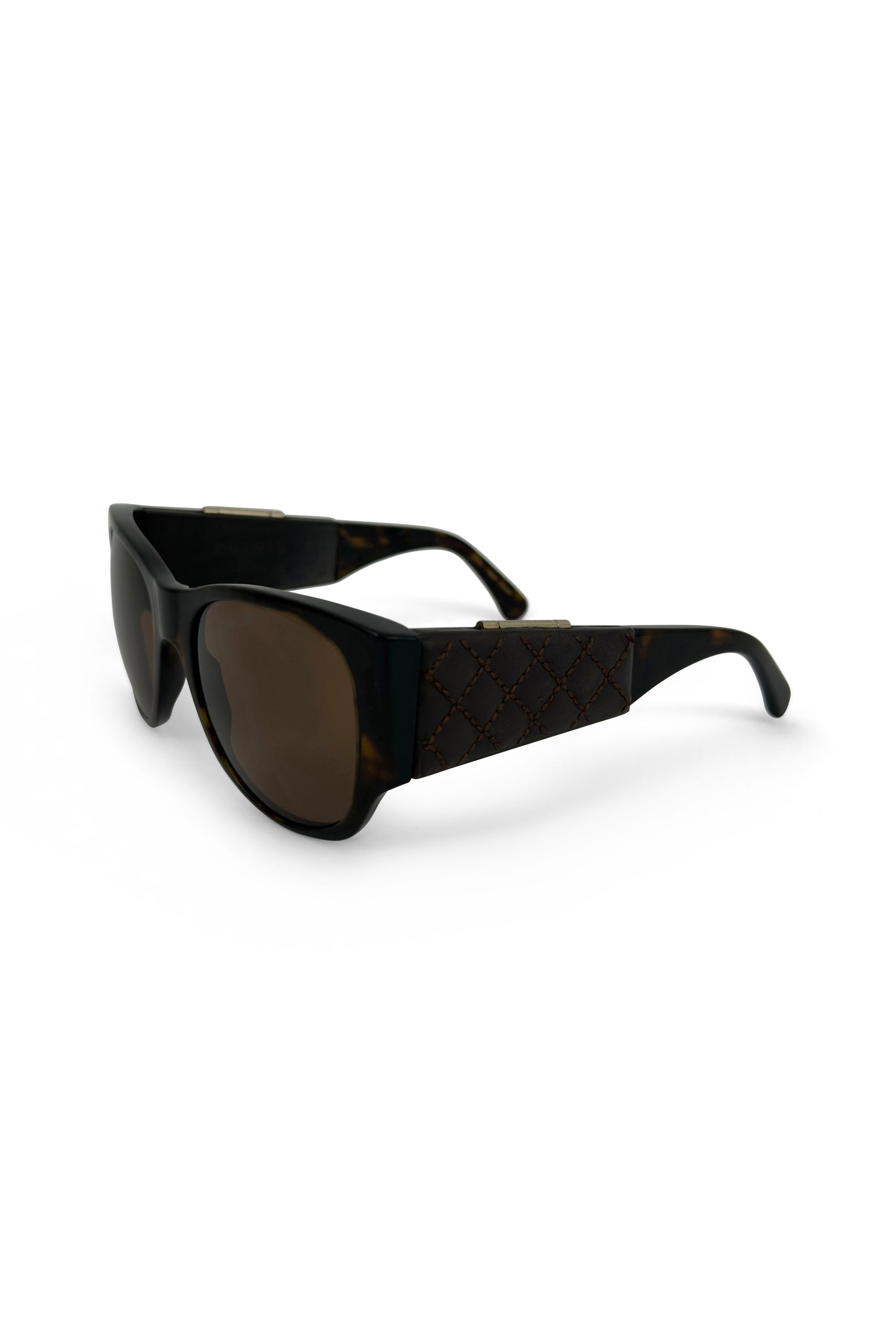 Chanel brown leather and acrylic hidden-mirror wraparound sunglasses, Fall 2010, front view.