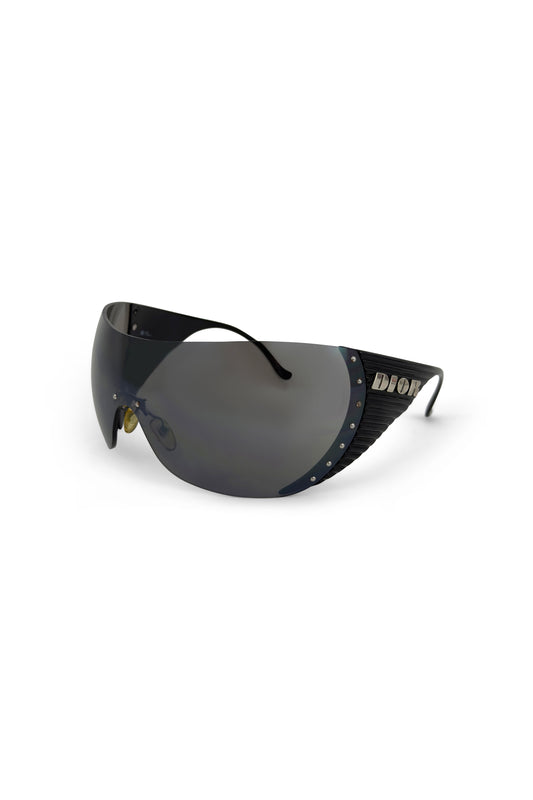 Black oversized Dior shield sunglasses with ribbed temples and metal stud accents.