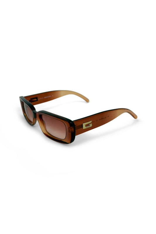 Brown rectangular Gucci sunglasses with brown acrylic frame and Square G hardware, angled view on white background