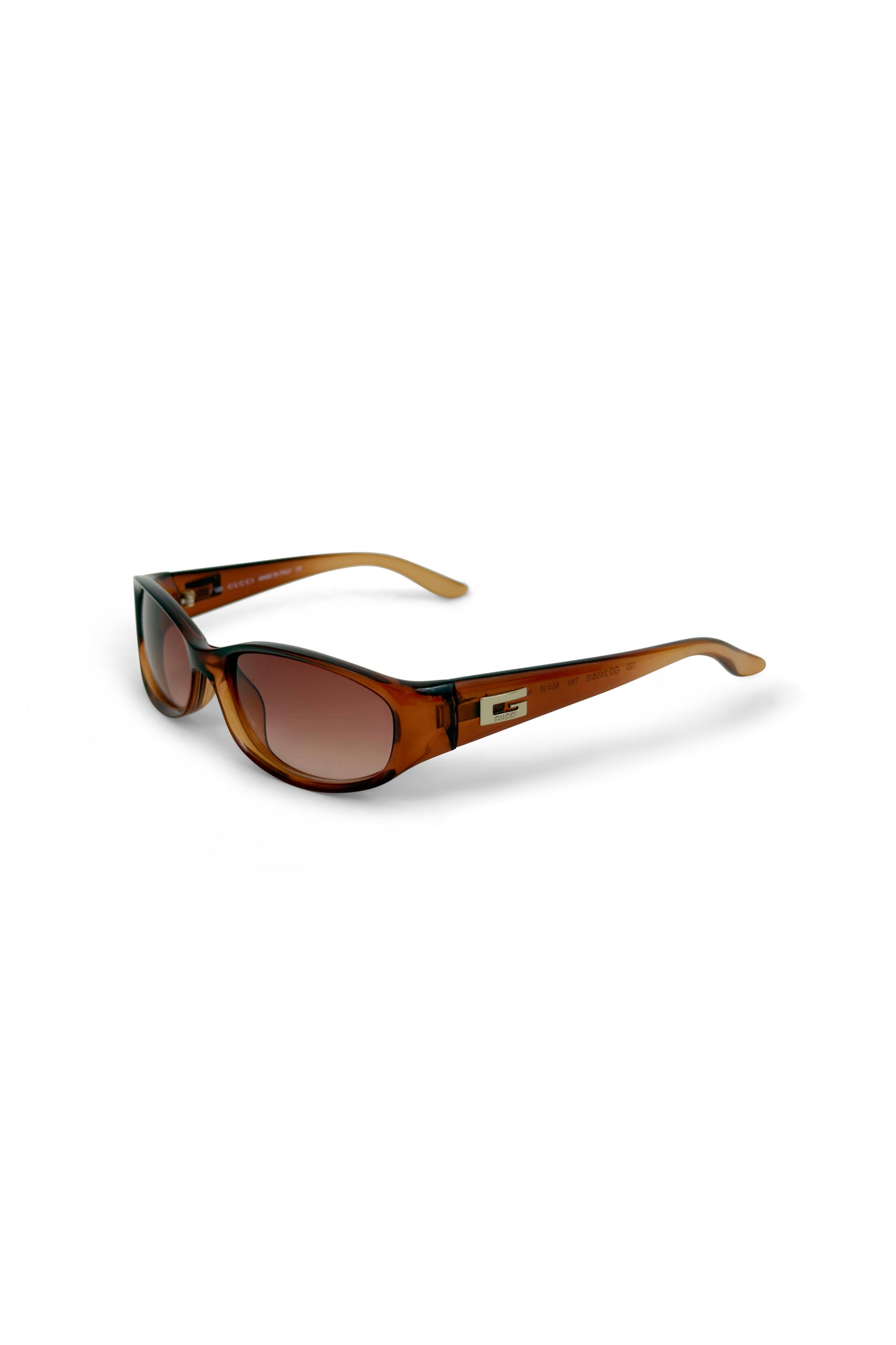 Brown translucent rounded-rectangle Gucci sunglasses with G hardware on white background