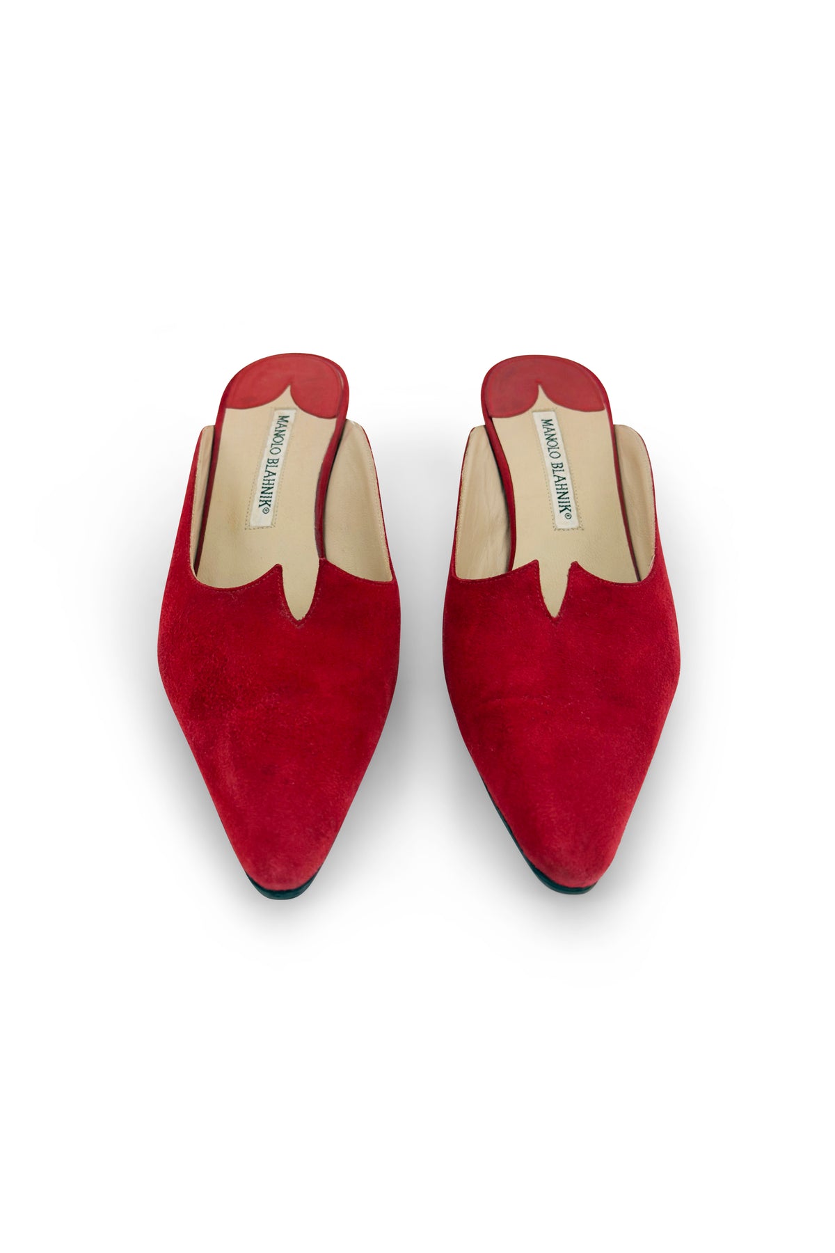 Red suede pointed kitten-heel mules by Manolo Blahnik from the 2000s.