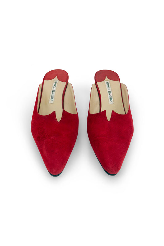 Red suede pointed kitten-heel mules by Manolo Blahnik from the 2000s.